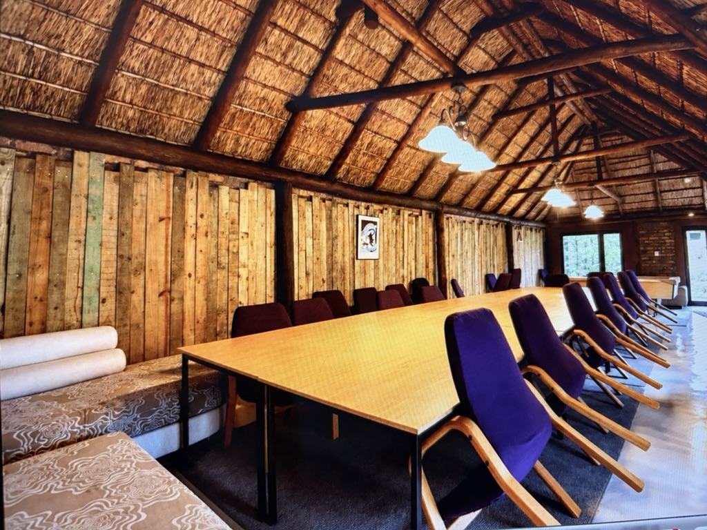 The conference room laid out with a boardroom table and chairs